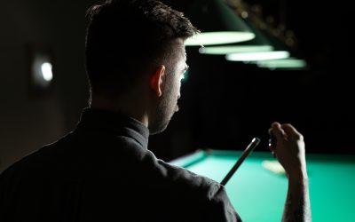 Close up of a unrecognizable man chalking pool cue