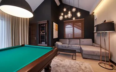 modern billiard room with a beautiful table and large windows